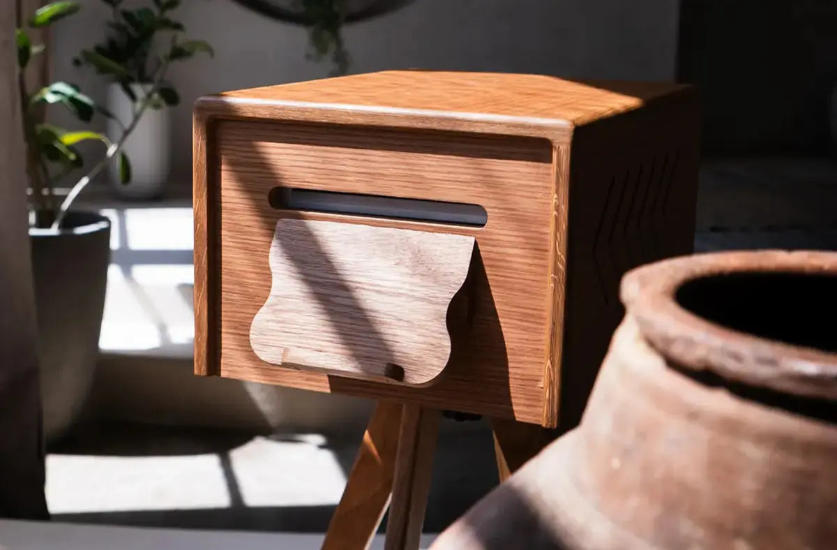 a wooden printer frame captured on a soft sunlight casts shadows